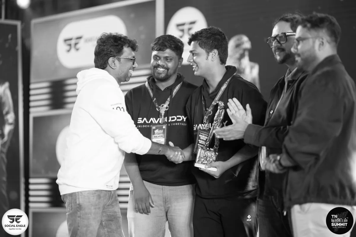 Aswin and Vishva receive an award from Dharaneetharan at the TN Digital Summit 2026